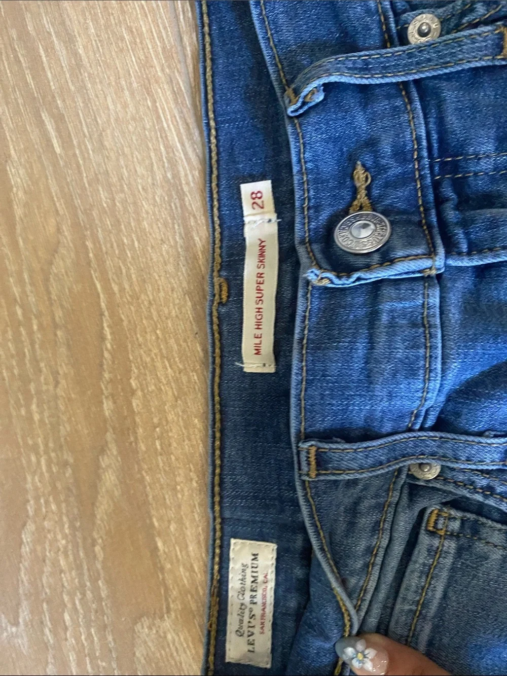 Levi's Slim Jeans in Medium Blue with Tan Patch